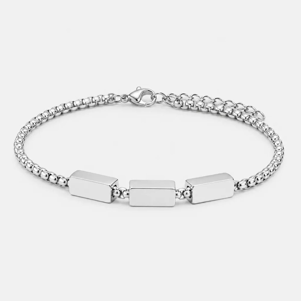 Bracelete masculino prata com detalhes retangulares em aço inoxidável polido